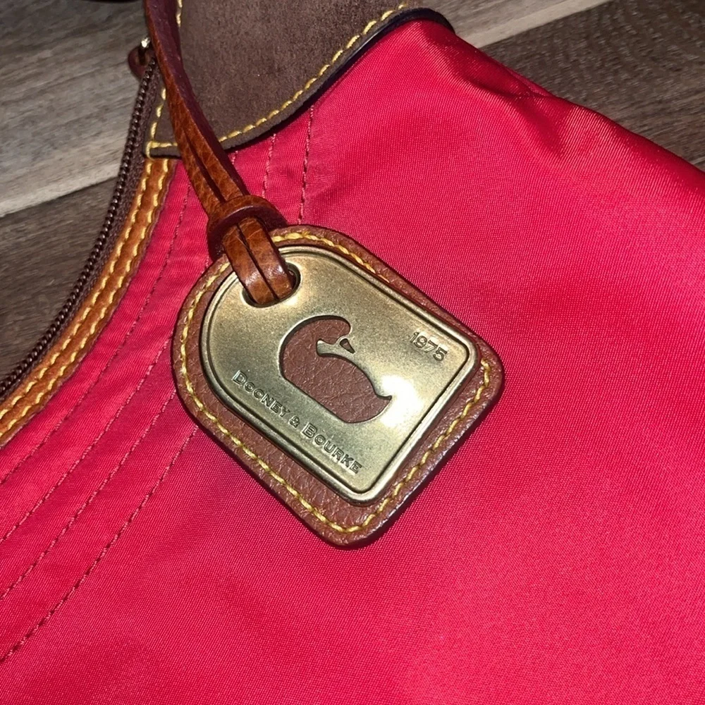 Dooney & Bourke boho sak purse in red with hot pink interior 1975 tag